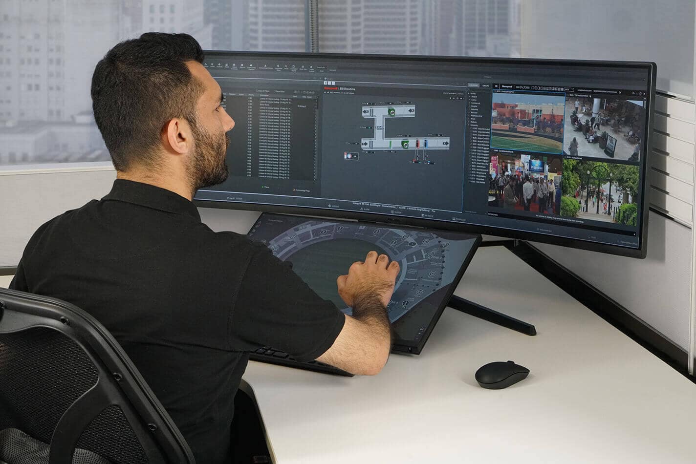 Person monitoring security on screen