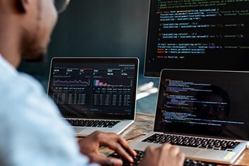 Code on computer screens